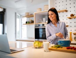 happy-beautiful-woman-learning-to-cook-with-online-2021-09-02-07-09-03-utc.jpg